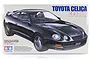 Tamiya 1/24 scale Toyota Celica GT-FOUR plastic model kit box art featuring a black sports car on a white background.