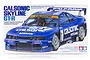 Tamiya 1/24 scale Calsonic Skyline R33 GT-R model kit box art featuring a blue racing car with white sponsorship decals on a white background.