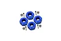 Four blue anodised aluminium wheel hex adaptors with pins and lock nuts laid out on a white background.