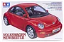 Tamiya 1/24 scale Volkswagen New Beetle plastic model kit box art showing a red car.