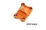 GPM orange anodized aluminum rear gearbox cover for RC vehicles, featuring machined chamfered edges and engraved branding.
