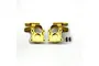 Two brass weighted steering hubs and four small metal bushings displayed on a plain white background.