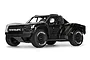 ARRMA Mojave Grom 4X4 RC short course truck in black with off-road tires against a white background.