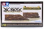 Tamiya 1/48 scale Brick Wall, Sand Bag & Barricade Set model kit box showing illustrations of finished brick walls, sandbags, and tank traps.