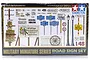 Tamiya 1/48 scale Road Sign Set plastic model kit box, featuring various European-style road signs, street lamps, a wooden fence, and a wagon wheel.
