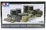 Tamiya 1/48 scale Jerry Can Set model kit box art showing various military fuel drums, jerry cans, and supply bags.