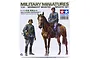 Tamiya 1/35 scale German Wehrmacht Mounted Infantry model kit box featuring painted illustrations of a mounted soldier and a standing soldier.