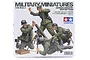 Tamiya 1/35 scale German Infantry Mortar Team plastic model kit box art showing four soldiers operating a mortar.