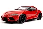 Red Toyota Supra GR RC car model viewed from the front three-quarter angle on a white background.