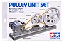 Tamiya Pulley Unit Set packaging showing an assembled pulley system with an electric motor, belts, and various sized pulleys on a base.