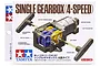 Product packaging for Tamiya 4-Speed Single Gearbox (70167) showing a diagram of the assembled gearbox, gears, motor, and crank arms.