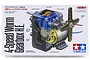 Tamiya 4-Speed High Efficiency Worm Gearbox Set packaging showing a detailed illustration of the internal gears, motor, and crank arm.
