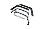 Axial black plastic front fenders and mounting hardware parts laid out on a plain white background.