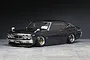 Pandora RC C130 Laurel RC body shell painted dark purple with chrome trim and custom wheels.
