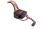 Studio shot of a black electronic speed controller with a copper heatsink and multi-colored wires on a white background.