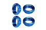 Four blue anodized aluminium shock collars shown from angled and top perspectives on a plain white background.