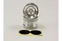 Two satin chrome RC buggy rims stacked vertically with a sheet of black circular stickers in front on a plain background.