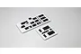 Kyosho hatch set featuring two white panels with black foam inserts and small white knobs on a light grey background.
