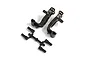 Kyosho aluminium steering hub carriers in gunmetal with associated plastic parts on a white background.
