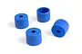 Four blue plastic cylindrical wheel washers or spacers arranged on a plain white background.