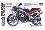 Tamiya 1/12 scale Honda VFR750R model kit box art showing a detailed motorcycle with transparent fairing panels.
