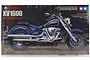 Tamiya 1/12 scale Yamaha XV1600 RoadStar motorcycle model kit box art showing a detailed cruiser motorcycle on a dark background.