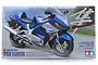 Tamiya 1/12 scale Suzuki GSX1300R Hayabusa plastic model kit box art showing a blue and silver motorcycle.