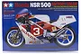 Tamiya 1/12 scale Honda NSR500 Factory Color motorcycle model kit box art showing a red, white, and blue racing bike.