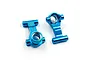 Two blue anodized aluminium front steering hubs for RC cars shown against a clean white background.