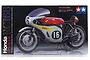 Tamiya 1/12 scale Honda RC166 GP Racer motorcycle plastic model kit box art showing a red and silver vintage racing motorcycle.