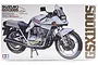 Product box for Tamiya 1/6 scale Suzuki GSX1100S Katana plastic model kit featuring an illustration of the silver motorcycle.