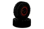 Two black RC crawler tires with aggressive tread mounted on black and red rims against a plain white background.
