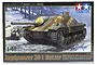 Tamiya 1/48 scale German Jagdpanzer 38(t) Hetzer tank destroyer model kit box art showing a camouflaged tank in a snowy winter landscape.