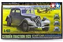Tamiya 1/48 scale Citroen Traction 11CV Staff Car plastic model kit box art showing a grey vintage car in a field with a biplane in the background.