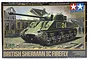 Tamiya 1/48 scale British Sherman IC Firefly plastic model kit box art showing a green tank in a war-torn street scene.