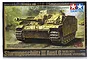 Tamiya 1/48 scale German Sturmgeschutz III Ausf.G tank destroyer plastic model kit box art showing a camouflaged tank in a field.