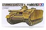 Tamiya 1/35 scale German Sturmgeschutz IV Sd.Kfz. 163 model kit box art showing a tan tank with a soldier figure.