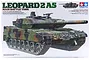 Tamiya 1/35 scale Leopard 2 A5 Main Battle Tank plastic model kit box art showing a camouflaged tank.