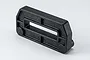 Black moulded plastic RC spare part with a central rectangular cutout and reinforced framing on a white background.