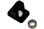 A black plastic centre driveshaft brace and a small metal ball bearing against a plain white background.