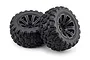 Two black RC truggy wheels and tyres with aggressive tread patterns mounted on multi-spoke rims against a white background.