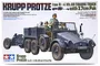 Tamiya 1/35 scale model kit box art featuring a German Krupp Protze Kfz.69 towing truck with a 3.7cm Pak anti-tank gun and four crew figures.