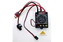 Top-down view of an MJX RC 60A brushless electronic speed controller with wires, power connector, power switch, and a small marker piece.