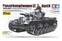 Tamiya 1/35 scale German Panzerkampfwagen III Ausf.N plastic model kit box art showing a detailed tank illustration with a commander figure.