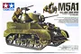 Tamiya 1/35 scale U.S. M5A1 Light Tank plastic model kit box art showing a detailed illustration of the tank with a crew member and mortar team.