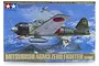 Tamiya 1/48 scale Mitsubishi A6M3 Zero Fighter Hamp plastic model kit box art showing a green fighter plane flying over a mountainous landscape.