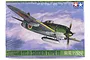 Tamiya 1/48 scale Kawanishi N1K1-Ja Shiden Type 11 fighter model kit box art showing the aircraft in flight against a cloudy sky.