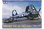 Tamiya 1/48 scale Vought F4U-1D Corsair model kit box art showing the aircraft with folded wings and a moto-tug on an aircraft carrier deck.