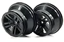Two black ARRMA RC short course truck rims shown from a front-angled perspective against a white background.