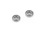 Two metal shielded ball bearings for RC vehicles, shown from an angled perspective against a white background.